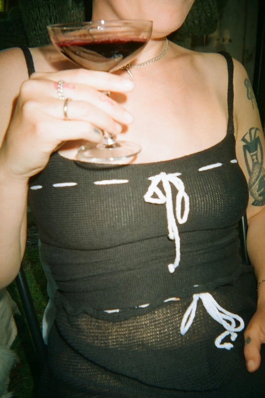 Pearle Knits Skinny Strap Tie Top in Black